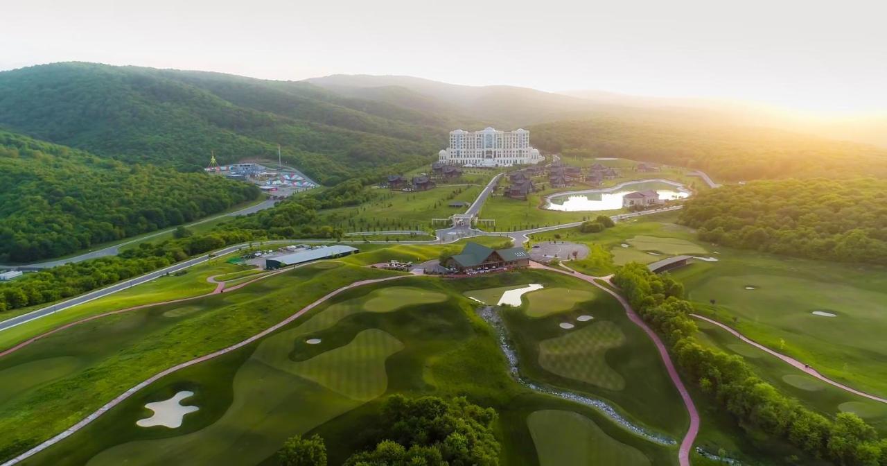 Quba Palace Hotel & Golf Resort Exterior photo Aerial view of the golf course at the Grand Resort